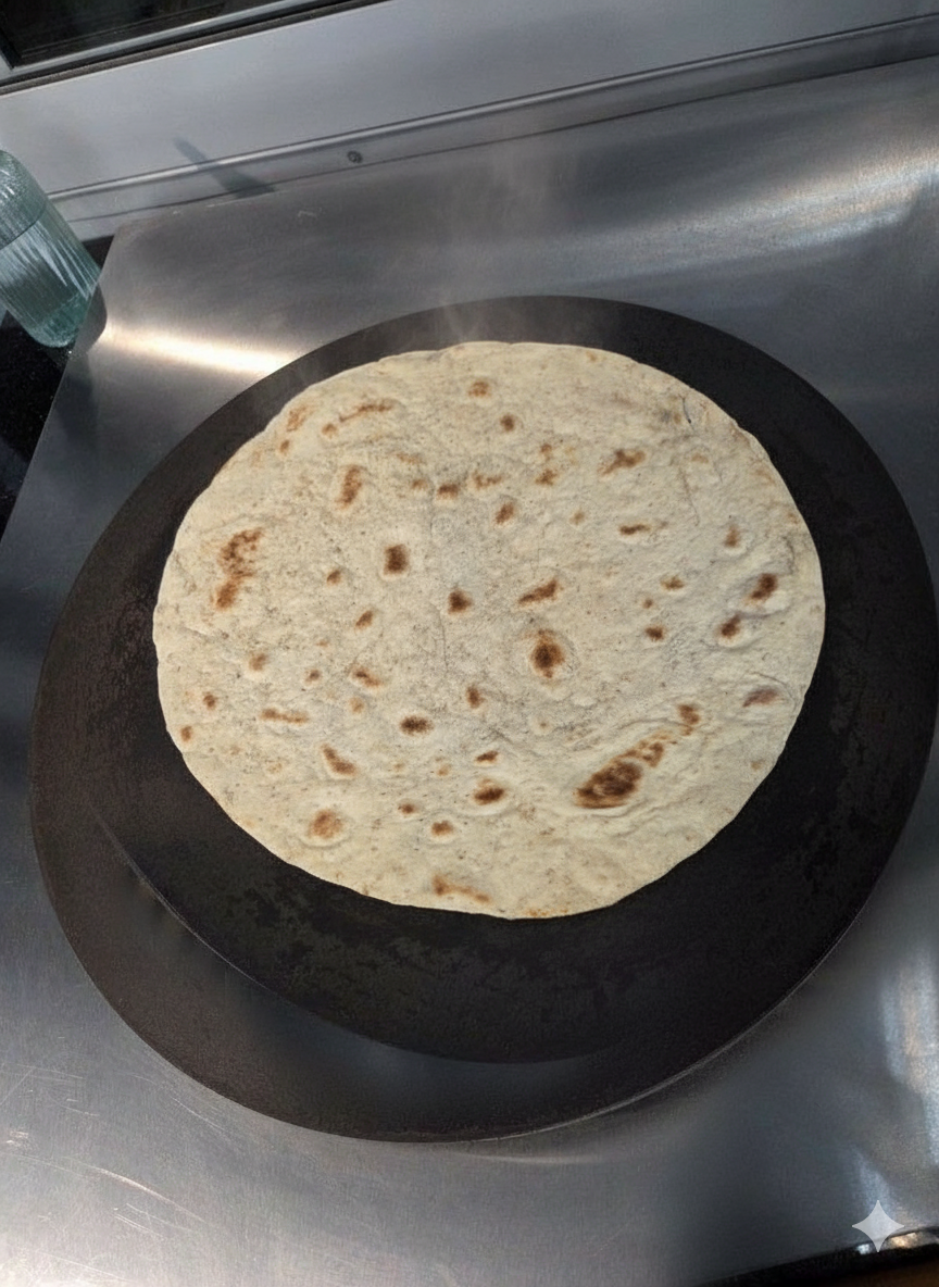 Vers brood wordt gemaakt op de grillplaat